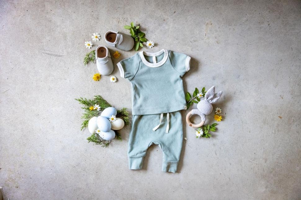 baby clothing and accessories flat lay